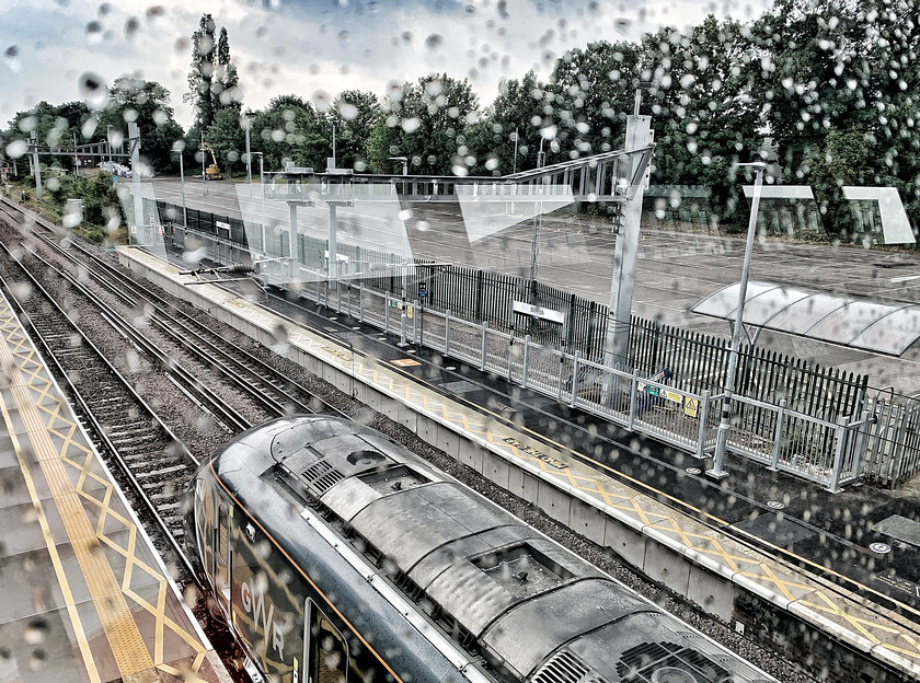 NewBridgeRain 4547 
 Slough Station 2020, iPhonography project while service disruption for Covid 19 
 Keywords: Slough, Railway, Station, Streetphotography, photography, abstract, selfie, trains, bridge, Berkshire